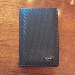 TUMI carbon fiber wallet